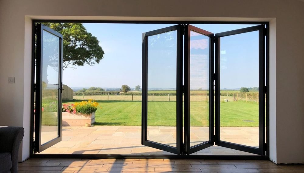 Folding doors opening onto a garden